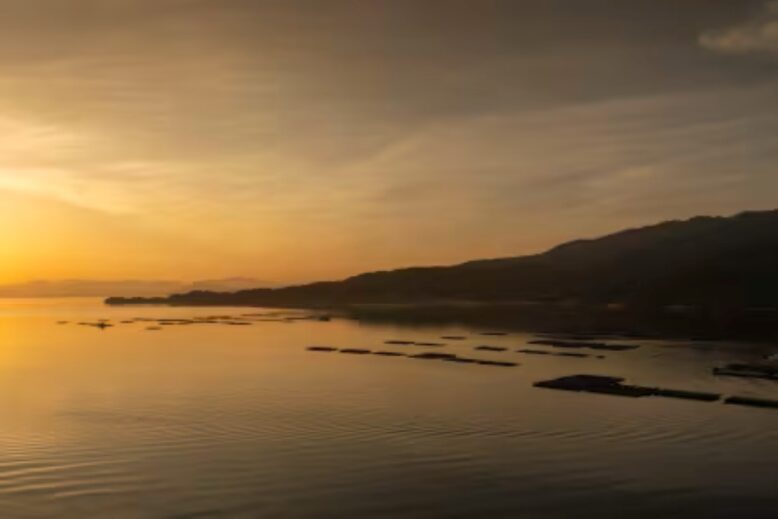Sunset view over the Seto Inland Sea and oyster farming rafts near KAI Miyajima