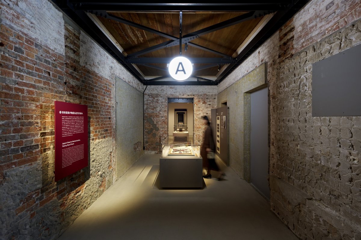 Entrance to Building A at Nara Prison Museum, exposed brick corridor with exhibition displays