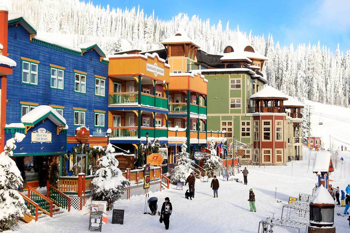 Colourful Victorian-style village buildings at SilverStar Mountain Resort, British Columbia