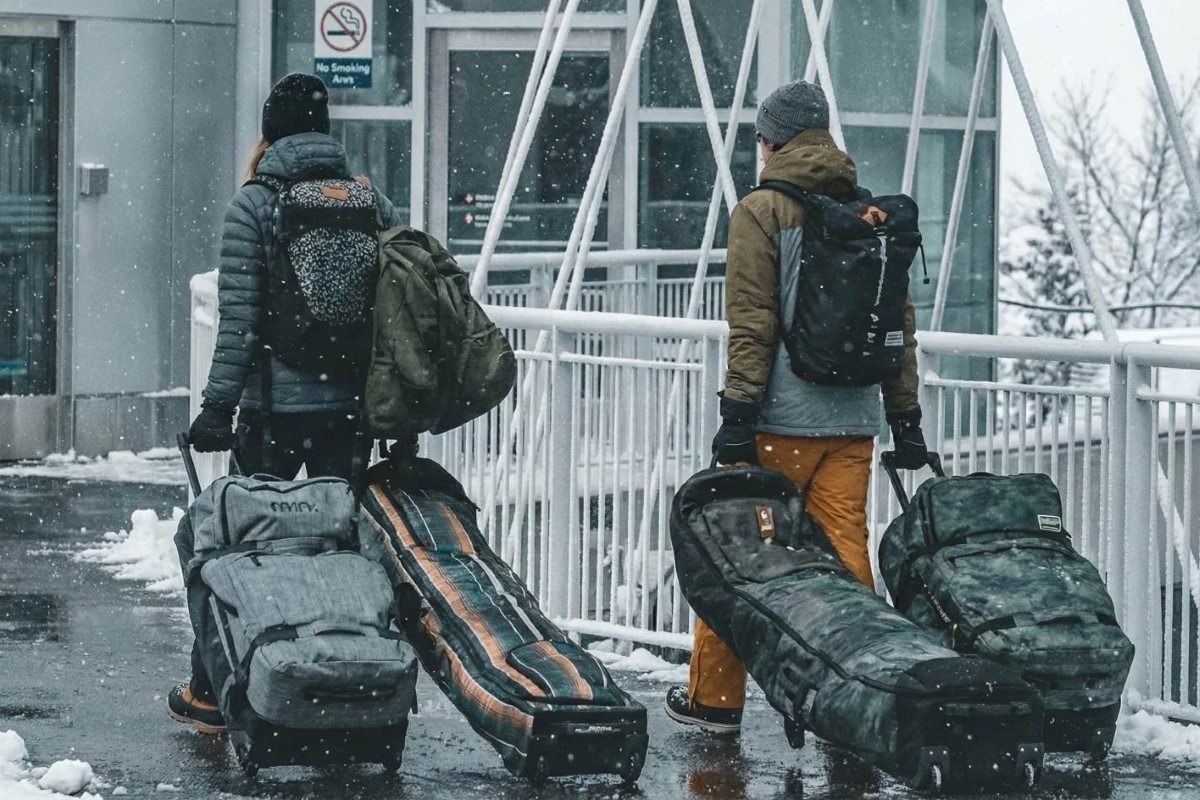 Travellers wth ski bags