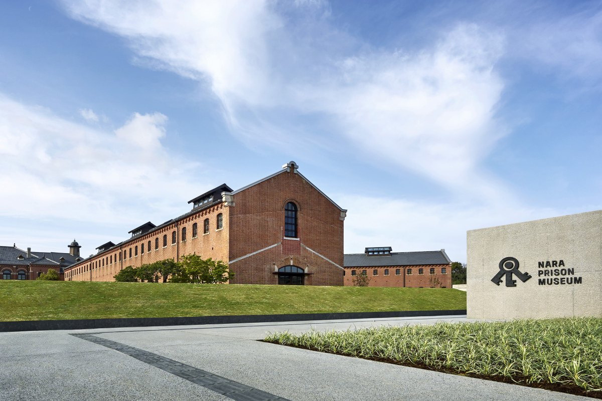 Exterior of Nara Prison Museum with entrance signage and red-brick facade
