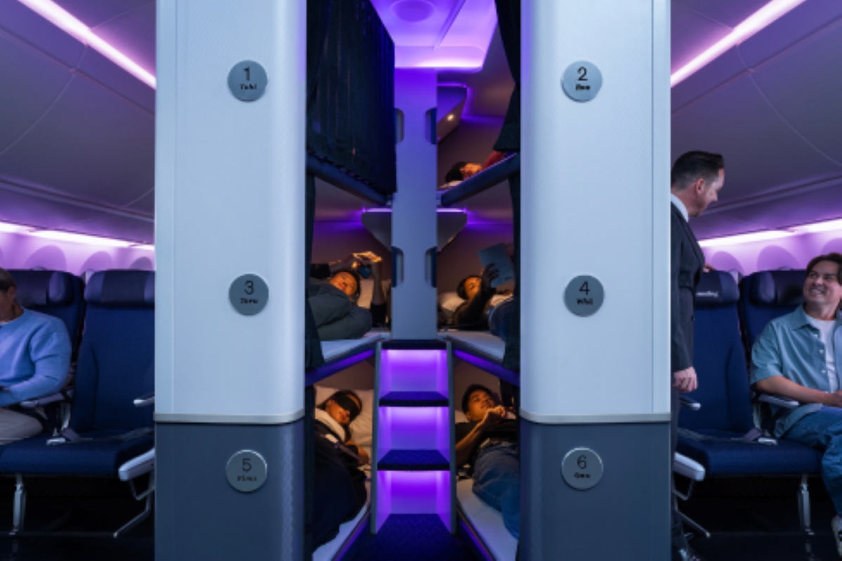 All six Air New Zealand Skynest capsules viewed from the access side, showing the numbered nests